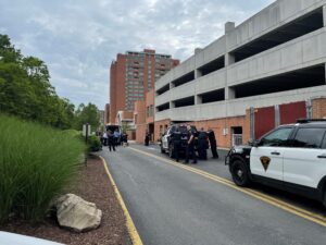 Woman killed in jump or fall from Marriott parking garage